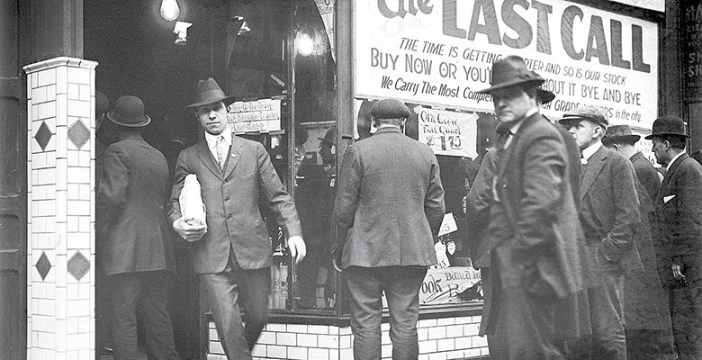 A Detroit liquor store posts a “last call” sale before Prohibition goes into effect.##Archived photo