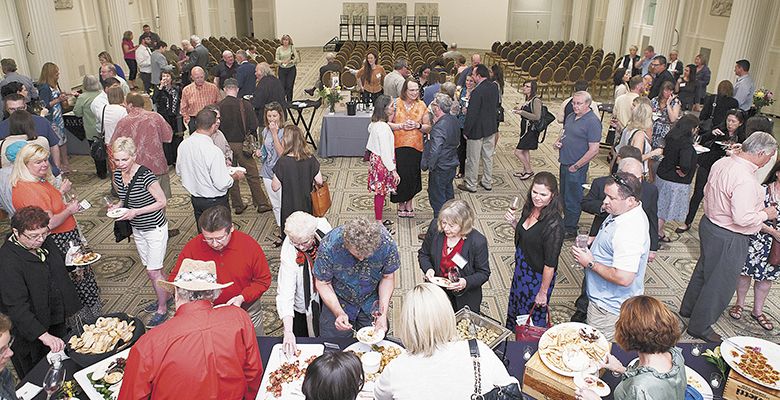 Guests enjoy wines from the founding wineries and small plates during the special event held at the Portland Art Museum.##Photo by Anna Campbell