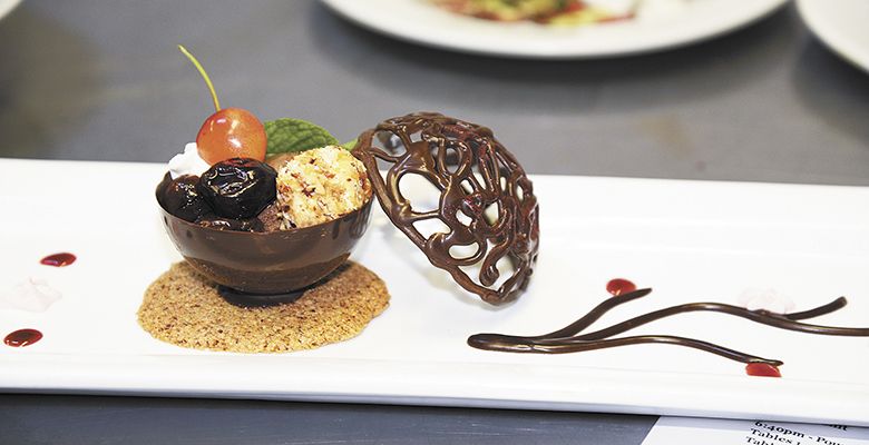 Banick won the contest with her dessert, a dark chocolate
cherry “moon” filled with decadent, edible treasures.##Photo provided