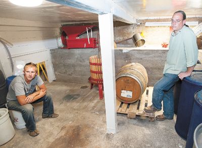 Xylem Wines partners Forrest Schaad, left, and Jason Brumley survey their mini-winery in the basements of Brumley s McMinnville home.