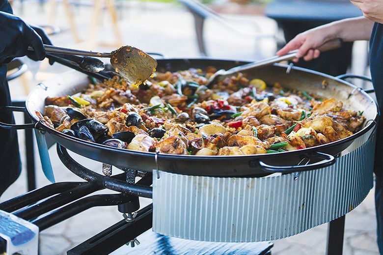 A person cooking paella at Abacela. ## Photo provided by Abacela A person cooking paella at Abacela. ## Photo provided by Abacela