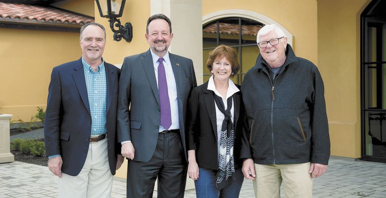 Linfield College Center for Wine Education Director Greg Jones, Linfield College President Thomas Hellie, and Grace and Ken Evenstad celebrate the endowment at Domaine Serene outside Dayton. ##Photo Provided