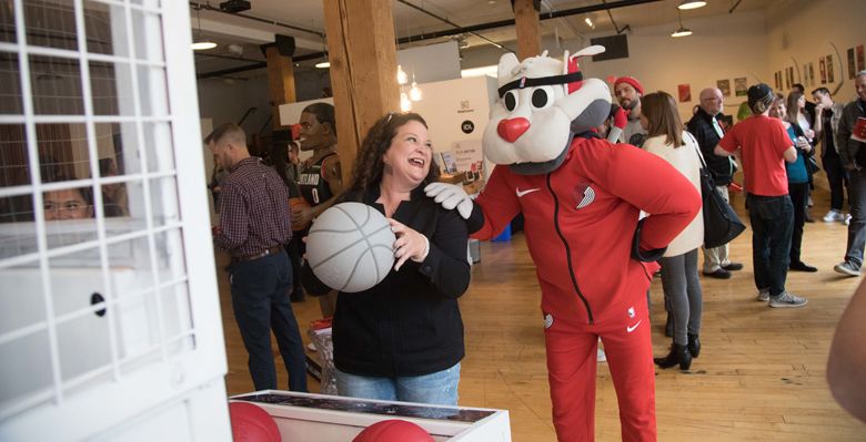 Adelsheim unveiled the signature wine labels at a private event in Northwest Portland, April 8. The Blazers mascot, Blaze, made an appearance in the crowded gallery space. ##Photo provided