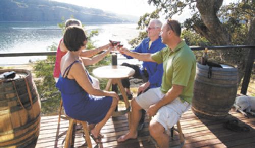Guests on the deck at Memaloose’s new tasting room located on the banks of the Columbia and Klickitat rivers.