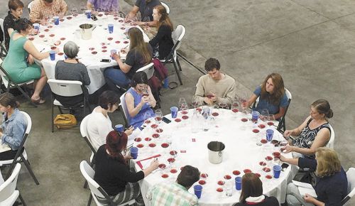 Guests at the event work on tasting notes for the wines, all made from Dundee Hills fruit.