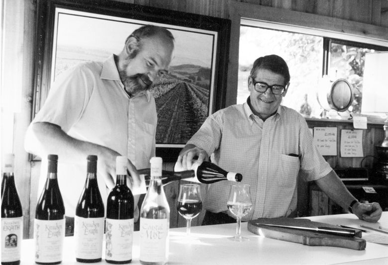 Oregon wine pioneers Dick Erath (left) and Cal Knudsen pouring wine at the Knudsen Erath Winery tasting room in 1980.##Photo courtesy of Knudsen Vineyards
