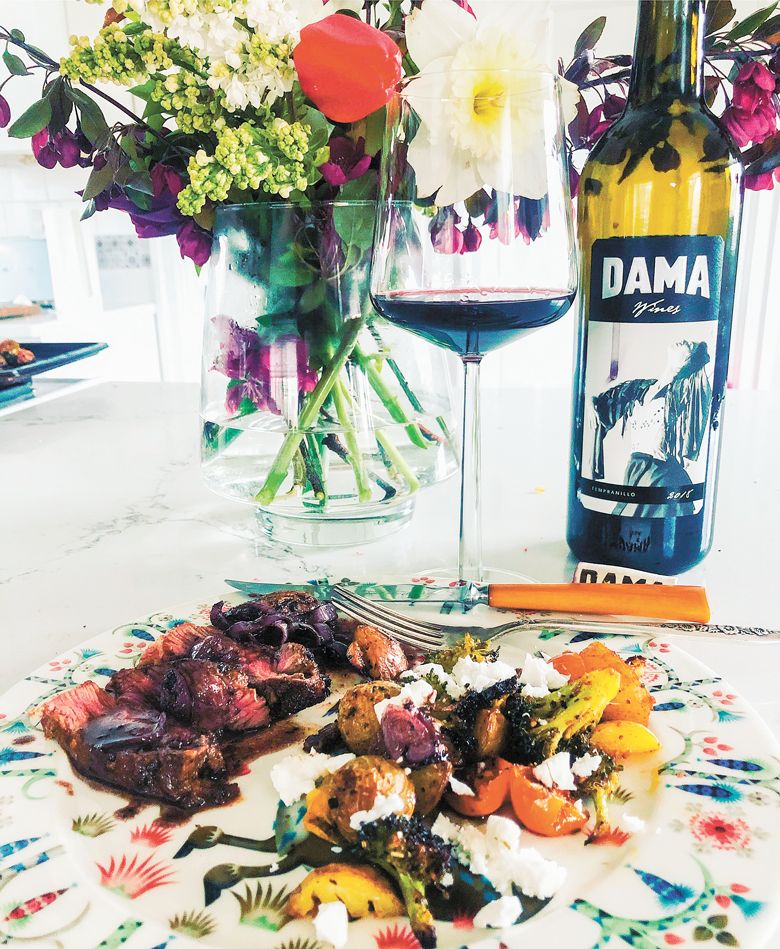 DAMA Wines’ Mary Derby enjoys pan-seared skirt steak and vegetables with her Tempranillo.##Photo provided by DAMA Wines