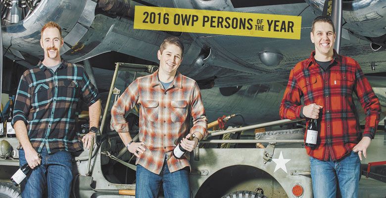 Iraq war veterans Ryan Mills, Paul Warmbier and Ben Martin create wine with a mission. Here they stand at the Evergreen Air & Space Museum in McMinnville. ##Photo by Kathryn Elsesser.