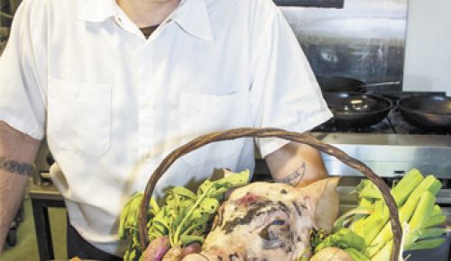 Chef/Co-owner Paul Bachand of Recipe in Newberg sources meat and produce for the 10-Mile Dinner hosted at his restaurant. Photo by Andrea Johnson. Chef/Co-owner Paul Bachand of Recipe in Newberg sources meat and produce for the 10-Mile Dinner hosted at his restaurant. Photo by Andrea Johnson.
