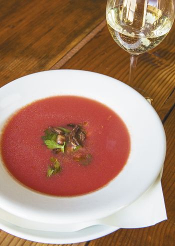 The chilled tomato soup with savory pork cracklins was inspired by a late night BLT the chef ate while tasting the Natalies s Estate 2010 Elephant Mountain Viognier. Photo by Andrea Johnson.