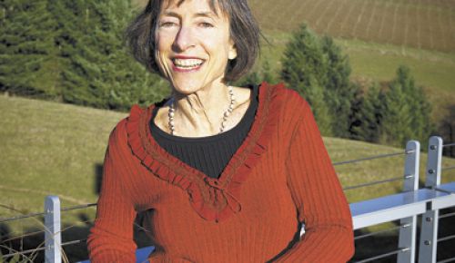 Ronni Lacroute stands on the deck of WillaKenzie’s new tasting room, which sits on carefully engineered stilts. Ronni says the property had no more flat areas on which to build.