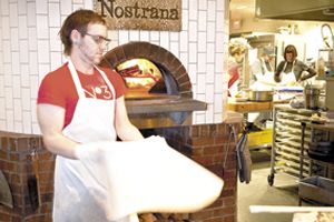 Joshua Shaham, Cathy Whims and Hilary Berg talk pizza and passion at Nostrana in Portland.  Photo by Andrea Johnson.