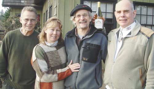 Michael (right) and Linda Armellino, with friend John Ginter, enjoy a visit to Oregon with John Paul (middle) of Cameron Winery.