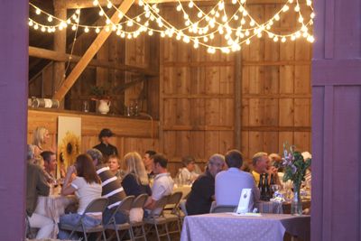 Guests enjoy a Barn Dinner prepared by Heidi Tunnell.  Photo provided.