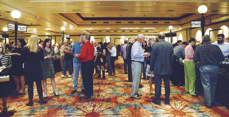 Guests mingle during the 2016 Greatest of the Grape at Seven Feathers Casino Resort. ##Photos by Angela Chenowith | www.chenowethphotography.com
