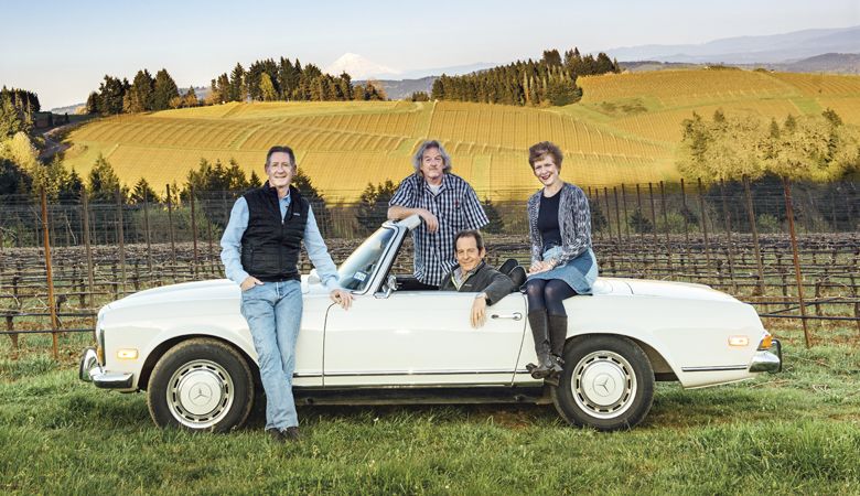 Colin Knudsen (from left), Cal Knudsen, David Knudsen and Page Knudsen Cowles shown with Cal and Julia Lee Knudsen’s 50-year-old 1970 Mercedes 280 SL purchased just before the 1971 founding of Knudsen Vineyards. ##Photo by Kathryn Elsesser