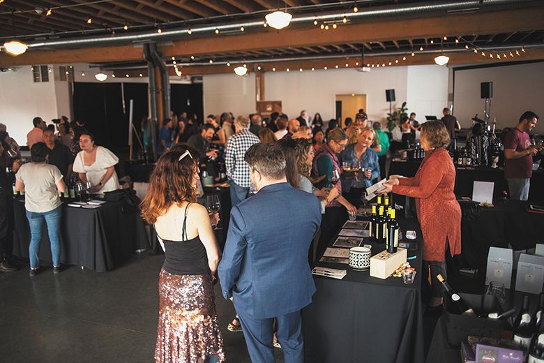 Attendees sampling Oregon-produced Malbec wines at Malbec in the City. ##Photo by Foundry 503