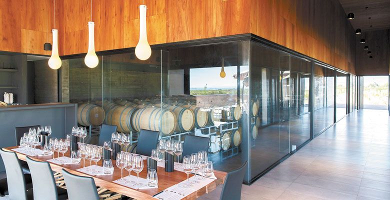 A sleek, modern interior allows visitors to view the barrel room at Corazon del Sol. ##Photo provided.
