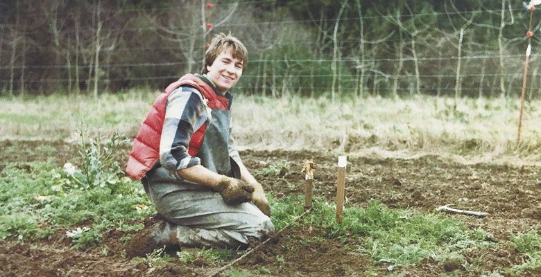 A young Joe Dobbes helps with his parents’ vineyard located in East Willamette Valley. ##Photo courtesy of Dobbes Family Estate