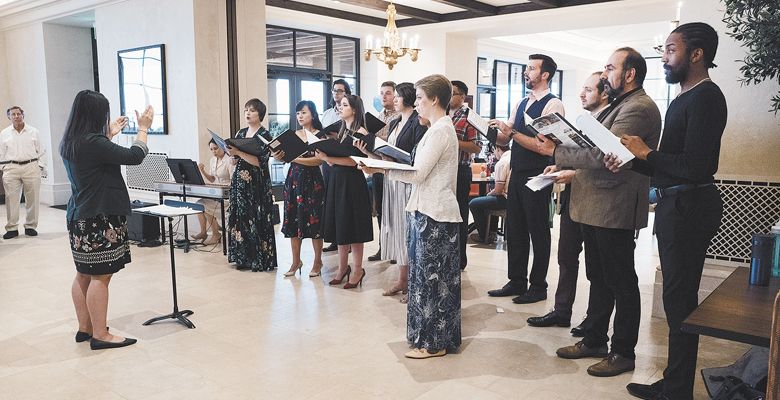 In 2018, Danielle Jagelski conducts the Aquilon Young Artists Choir at the Domaine Serene Clubhouse in Dayton. ##Photo by John Pak