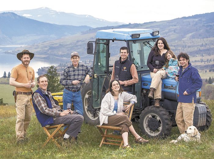 Members of the Lyle, Wash., creative collective include, from left, Brian McCormick of Memaloose Wines, Alexis Pouillon of Domaine Pouillon, Rob McCormick, Juliet Pouillon (seated), Luke Bradford of COR Cellars, Poppie Mantone, her daughter, Ava, and James Mantone. Photo by Patrick Bennett.