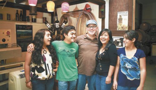 The Olson family includes (from left) Priscilla, 16, Johnny, 21, John, Joy, and
Rebekah, 18.