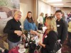 Michael Donovan, of RoxyAnn Winery in Medford, pours samples for eager tasters at the Southern Oregon Wineries Association trade tasting.  Photo by John Darling.
