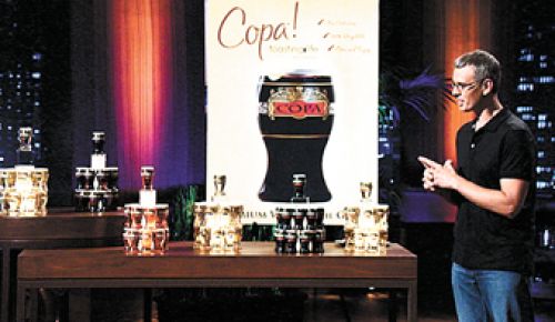 James Martin presents his business venture, Copa di Vino, to judges on the ABC-TV show “Shark Tank.”