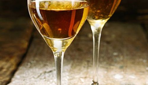 Sherry is produced in a variety of dry styles made primarily from the Palomino grape, ranging from light versions similar to white table wines, such as Manzanilla and Fino, to darker and heavier versions that have been allowed to oxidize as they age in barrel, such as Amontillado and Oloroso.