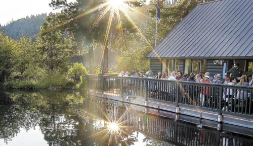 : The sun slips behind the Boathouse Restaurant at The Suttle Lodge.  ##Photo by Barbara Gonzalez