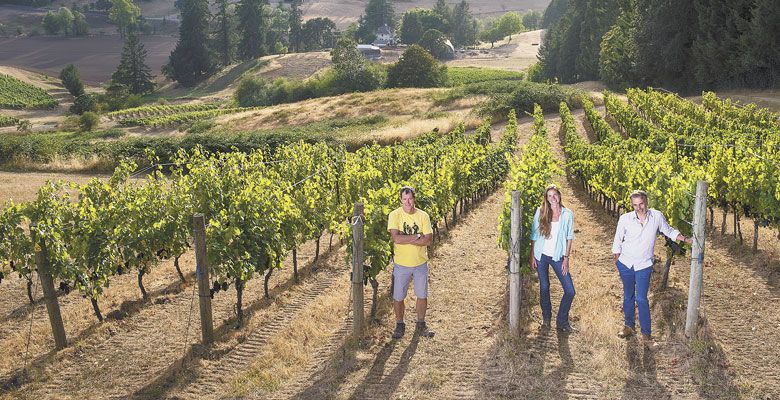 Jay Boberg (from left), Tracy Kendall and Jean-Nicolas Méo at Bishop Creek Vineyard, Domaine Nicolas-Jay’s acquired property in the Yamhill-Carlton AVA. ##Photo by Andrea Johnson
