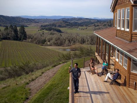 Guests soak up the sun on Youngberg Hill Inn’s new deck. Located near McMinnville, the inn boasts some of the best views in the entire Willamette Valley. Owners Wayne and Nicolette Bailey also make wine by the same name. Photo provided.