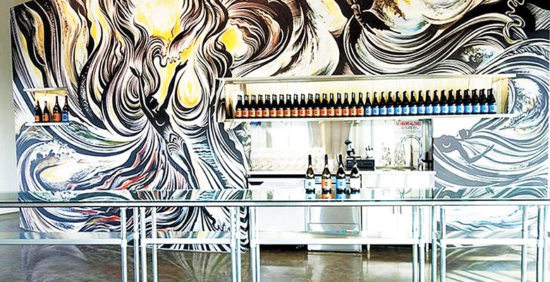 The original mural, by Ohio artist Cathie Bleck, at the Chapter 24 Vineyards tasting room in Dundee was inspired by the Missoula Floods.##Photo Provided