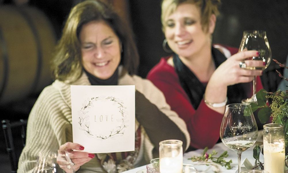 Guests read the menu aloud.##Photo by Andrea Johnson