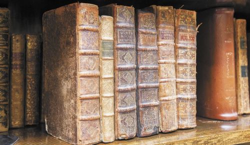 Pirages examined six of Rolland’s vintage French culinary books.##Photo by Marcus Larson.