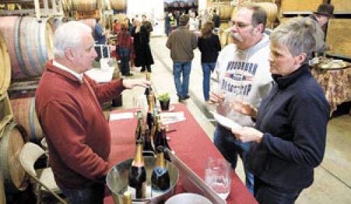 Marketing Director Buzz Kawders describes Domaine Meriwether s sparking wines to Steve and Felice Hamilton at Laurel Ridge Winery.