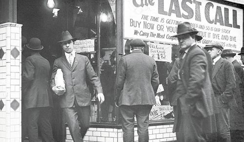 A Detroit liquor store posts a “last call” sale before Prohibition goes into effect.##Archived photo