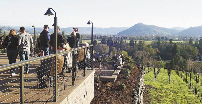 Guests gather on the deck of Cooper Ridge Vineyard’s new tasting room in Roseburg.##Photo provided