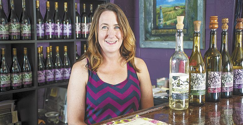 Michele Bloomquist, with her husband, Chris Eckels, purchased the Heisen property and started the winery in 2010.##Photo by Del Munroe
