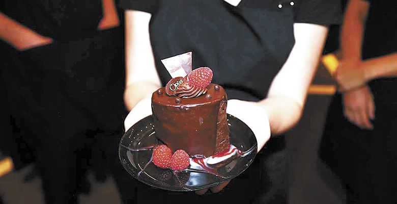 Each attendee received a raspberry cognac cake baked by Chef Valerie Anctil of OPUS in Carlton.##Photo by Matthew Bailey
