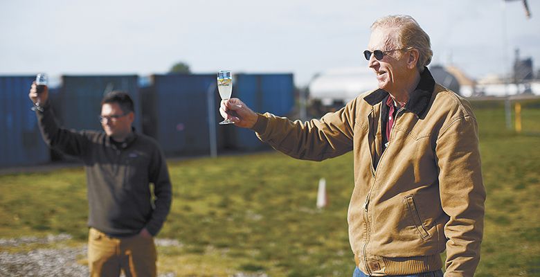 After everything is put away, Roger Anderson offers a toast to guests and workers.##Photo by Bryan Rupp