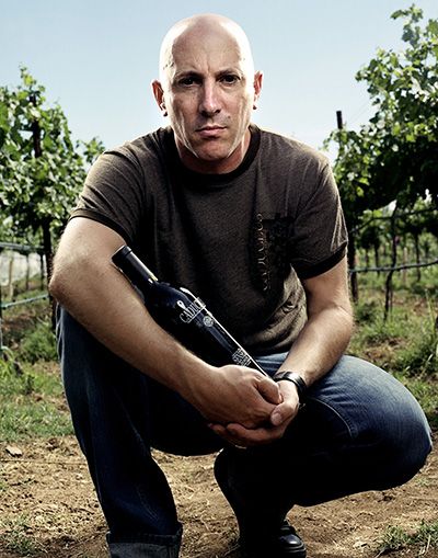 Maynard James Keenan holds a bottle of Caduceus Cellars.##Photo by Ron Newkirk