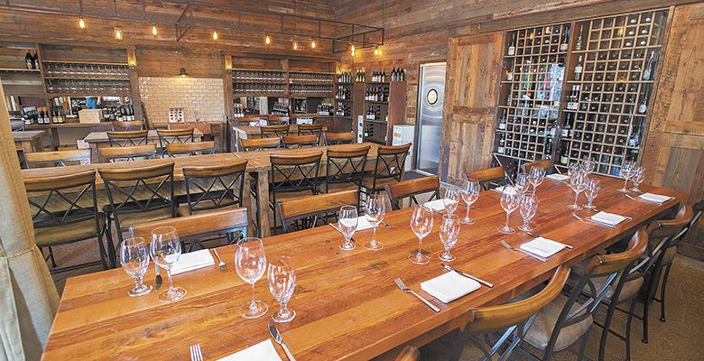 The Wine Village boasts long tables for tasting events or casual wine country get-togethers.##Photo by Marcus Larson