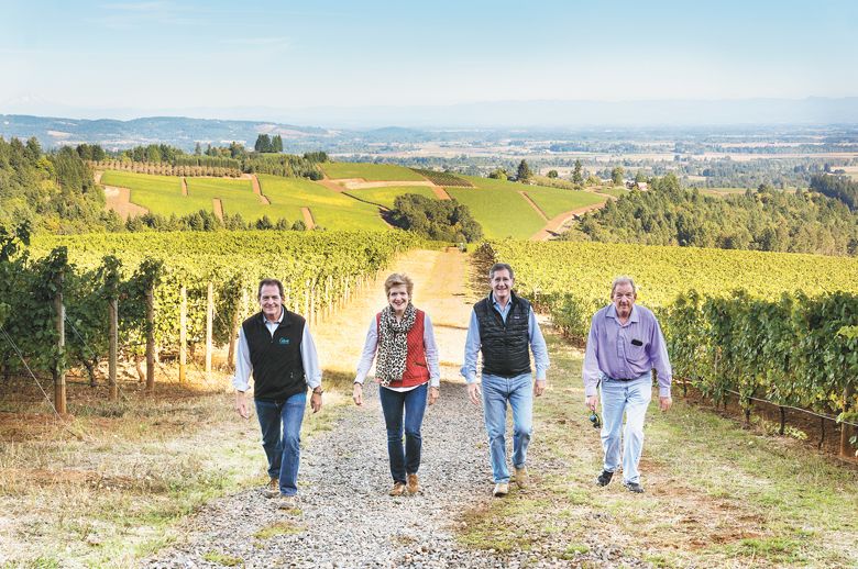 Second-generation Knudsen siblings walking the same section of their vineyard years later, in 2016. ##Photo provided by Knudsen Vineyard