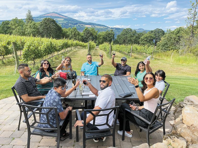 A group enjoying wine on the patio at Cathedral Ridge Winery. ##Photo provided BY CATHEDRAL RIDGE WINERY