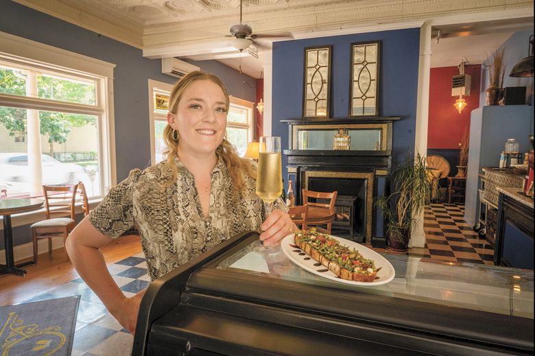 SIP Champagne and Dessert Bar co-owner Sierra Andrews suggests a glass of sparkling wine and avocado toast topped with goat cheese, tomatoes and micro greens drizzled with a balsamic reduction.