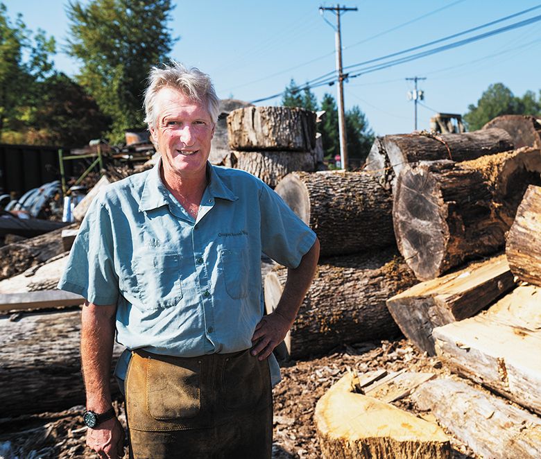 Rick DeFerrari, founder of Oregon Barrel Works, standing in his lumber yard. ## Photo by Rusty Rae