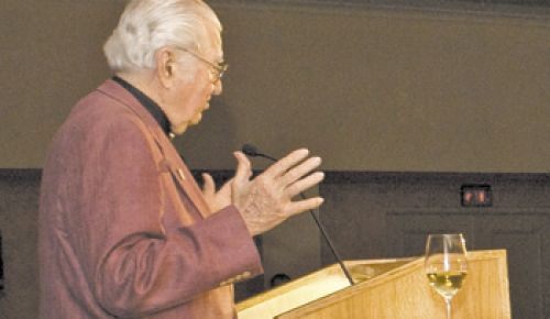 Bob Kerivan of Bridgeview Vineyards in the Illinois Valley accepts the Founders Award at the 2009 Oregon Wine Symposium Industry Awards Dinner. Kerivan would like to see the gallonage tax applied
to a greater number of wineries throughout the state. Photo by Andrea Johnson.