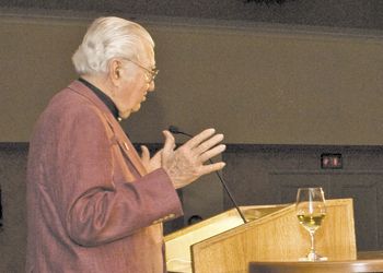 Bob Kerivan of Bridgeview Vineyards in the Illinois Valley accepts the Founders Award at the 2009 Oregon Wine Symposium Industry Awards Dinner. Kerivan would like to see the gallonage tax applied
to a greater number of wineries throughout the state. Photo by Andrea Johnson.