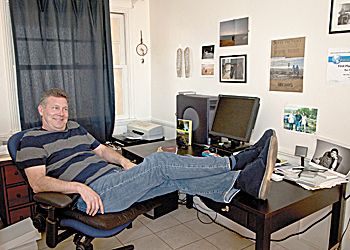 A simple office space adjoining the kitchen in his Santa Monica apartment is where Rex Pickett crafts his books and film scripts.